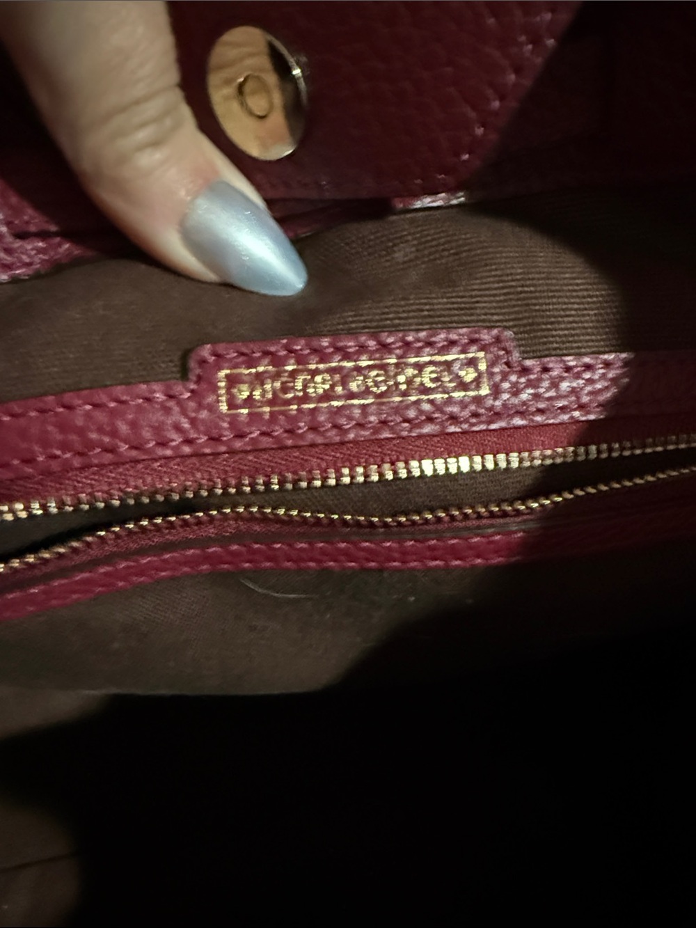 Henri Bendel tote bag features a pebbled texture and gold-toned hardware. - Picture 8 of 11
